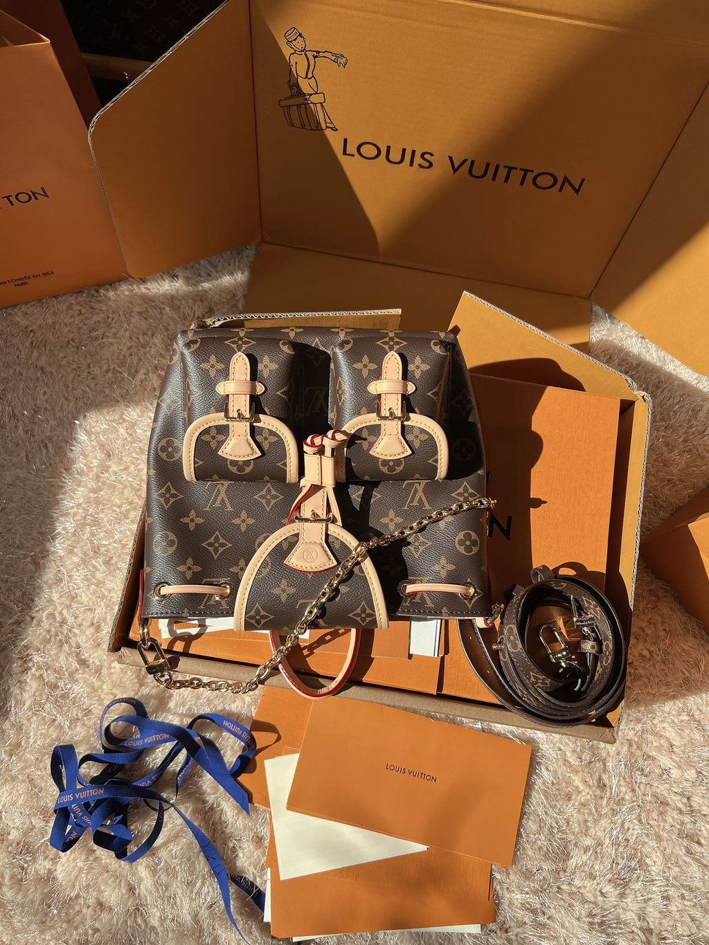 LV Excursion PM Monogram Canvas Backpack Shoulder Bag with Leather Trim and Drawstring Closure